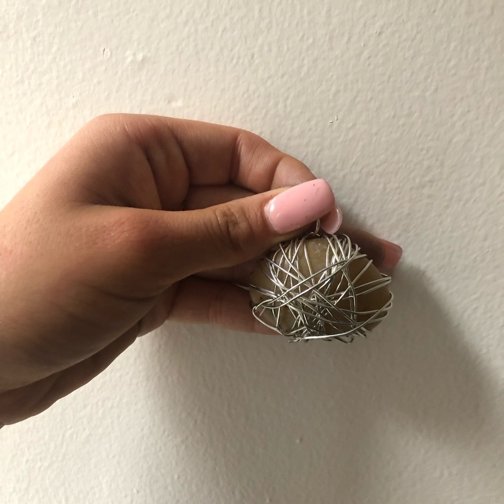 Stone charm